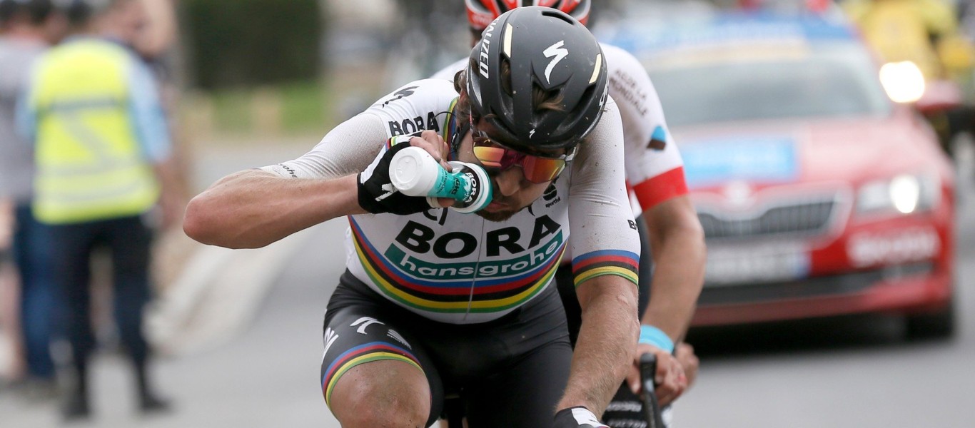 cyclist drinking water